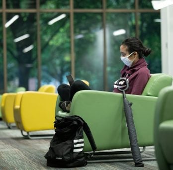 Student studying in the IDEA Commons.
                  