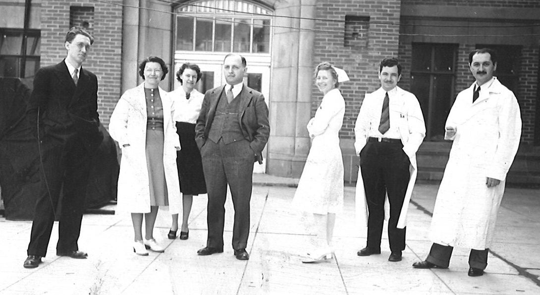 Dr. Abraham Low with colleagues, ca. 1940, Recovery International Collection